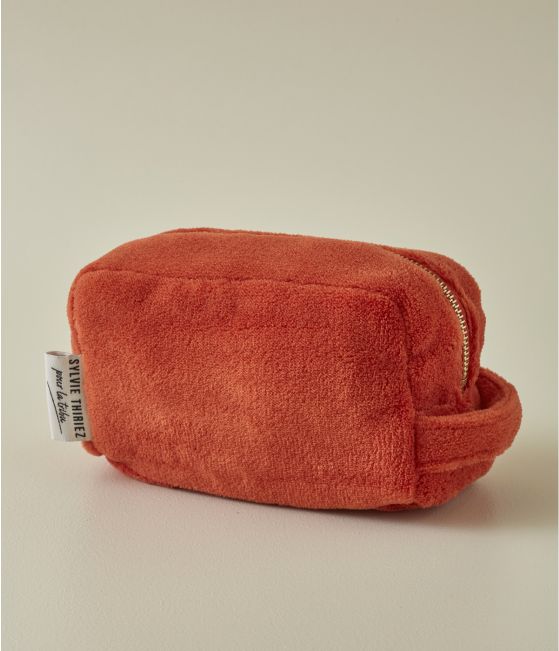 Burnished orange toilet bag